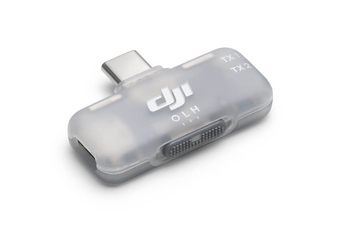 DJI Mic Mini connected via USB-C adapter to a smartphone for street interview
